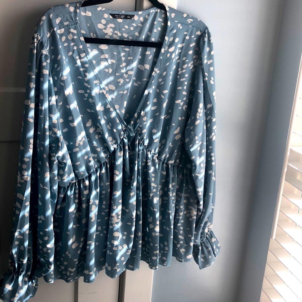 Plus size light blue v neck blouse